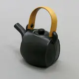 Chris Weaver, Teapot, black glazed porcelain with bent wood handle