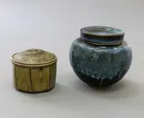 Campbell Hegan, Two lidded jars, stoneware, the first with jun glaze, the second with green olive ash glaze