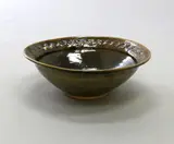 Barry Brickell, Large bowl, ash glazed stoneware, the upper rim with jun glaze splashes over interlaced relief pattern