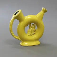 Nogaro Castagnon, Shaped liquor bottle, ceramic with yellow glaze
