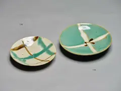 Mashiko Pottery, Stoneware plate attributed to Hamada Shoji, painted with iron gestural design over a jun glazed background with wax-resist cross decoration