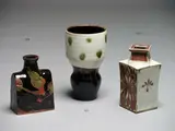 Japanese Studio Pottery, Slab vase attributed to Kawai Kanjiro, stoneware decorated with green and brown gestural design over a tenmoku background