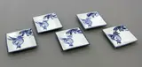 Japanese Studio Pottery, A set of five squared dishes attributed to Kondo Yuzo, blue and white porcelain painted with pomegranate sprays