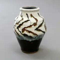 Shoulder vase by Mashiko Pottery, stoneware with poured nuka over tenmoku glazes and geometrical design to the shoulder, sold Dec 2020