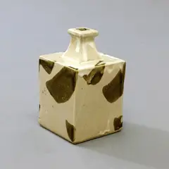 Mashiko Pottery, Short square section bottle vase, stoneware with cream glaze and olive brushwork