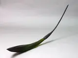 Ann Robinson, Twisted Flax Pod, cast glass and resin-coated steel