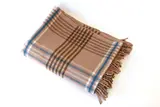 Travel rug by Early Roslyn New Zealand, in warm grey, brown, white and blue, sold Jun 2020