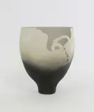 Debbie Pointon, Raku fired vase, with shaped and pierced side