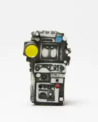 Signaller Figure by Ted Dutch, earthenware with coloured enamelled medallions and inserts, sold Sep 2019