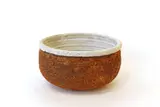 Warwick Lidgard, Deep bowl, stoneware, the interior covered with a thick crackling white glaze, unglazed textured exterior