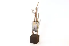 Debbie Pointon, Raku fired and bamboo twigs teapot sculptural form, on a wooden plinth