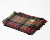 Early Onehunga Woollen Mills, Travel rug, in an orange, green, blue and black tartan design