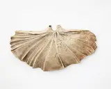 Winged hanging form in oxide washed by Len Castle, stoneware with double aperture, sold Sep 2019