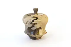 Small raku fired box by Peter Collis, with abstract decoration, offered Sep 2019