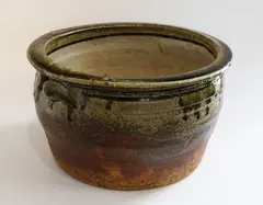 Circular planter by Len Castle, stoneware with poured green ash glaze, c. 1970s, sold Jun 2019