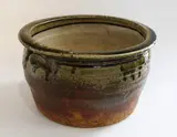 Circular planter by Len Castle, stoneware with poured green ash glaze, c. 1970s, sold Jun 2019