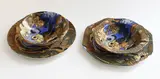 Frederick Rhead, Four Bursley Ware Amstel dishes, of different shapes