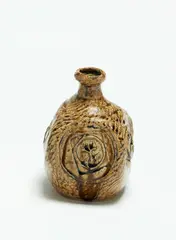 Bottle vase by Len Castle, stoneware with ash glaze and impressed decoration, sold Feb 2019