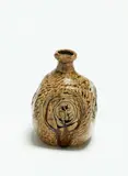 Bottle vase by Len Castle, stoneware with ash glaze and impressed decoration, sold Feb 2019
