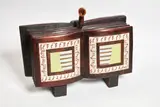 Warren Viscoe, Pipiwharauroa, carved timber, acrylic, stain and wax