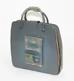 et al., Typewriter bag with Maatstaf publication attached