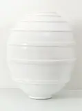 John Parker, White ovoid vase, decorated with raised concentric bands glazed ceramic
