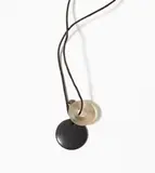 Warwick Freeman, Pendant, argillite, cast glass, sterling silver, cord (1985)
