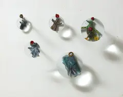 Give and Take Series by Peter Decker, carved Masonite, acrylic paint, aluminium, lazertran, magnifying glass, crushed bullet cases and nails, offered Jun 2017