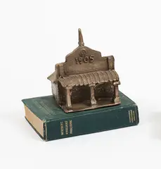 Frances Joan Dibble, Untitled – Architects’ and Builders’ Notebook, cast metal on found book