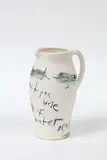 L. Budd, Untitled – Ceci n’est pas une a jug…, glazed earthenware jug