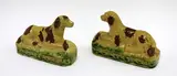 Luke Adams, Pair of early, unusual NZ pottery recumbent dogs