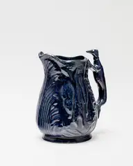 Luke Adams, Decorative blue glazed game jug, with greyhound handle