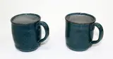 Elizabeth Lissaman, Two blue glazed pottery mugs