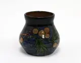 Elizabeth Lissaman, Hand decorated vase, with leaves and berries in a blue glaze
