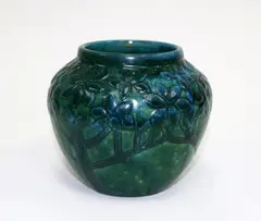 Olive Jones, Rare blue glazed vase, decorated with a flowering tree design