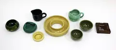 Olive Jones, Nine assorted pieces of pottery