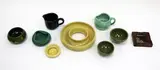 Olive Jones, Nine assorted pieces of pottery