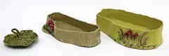 Mollé Goodsell, A leaf shaped dish marked ‘Mother’, together with two planters decorated with toadstools