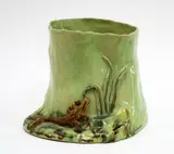 Mollé Goodsell, A large pottery planter, decorated with a lizard among foliage in low relief