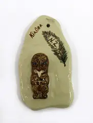 Mollé Goodsell, Pottery plaque, with unusual hand-painted decoration and with a tiki in low relief