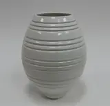 White ovoid vase by John Parker, incised with concentric bands, sold Sep 2016