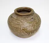 probably Song dynasty by A Chinese jar with lug handles, with poured olive green glaze, sold Sep 2016