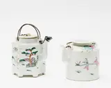 19th/20th century by Two Chinese famille rose teapots, similarly decorated with figures on a landscape, both with metal handles, sold Sep 2016