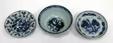 Meiji period by A group of three Japanese Arita blue and white ceramics, comprising a bowl and two saucer dishes, sold Sep 2016