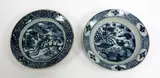 19th century by Two large Chinese blue and white dishes, each similarly carved with a long-tailed bird amongst flowers and fruits, sold Sep 2016