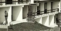 John Fields, Flats and couple, Panmure, Auckland 1969, black and white photograph