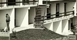 John Fields, Flats and couple, Panmure, Auckland 1969, black and white photograph