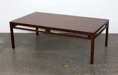 with rectangular top raised on square section legs by Danish rosewood coffee table, sold Mar 2015
