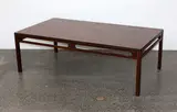 Danish rosewood coffee table, with rectangular top raised on square section legs