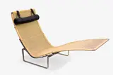 PK 22 hammock chair by Poul Kjaerholm for Fritz Hansen, continuous woven cane back seat on a steel frame, detachable leather head rest, sold Mar 2015